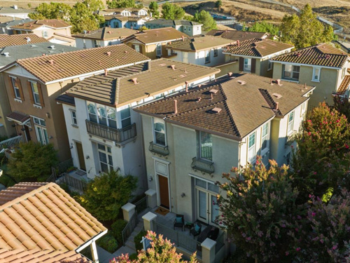 hm-1-website Overhead drone shot of homes in the Heritage Master Association located in San Jose.